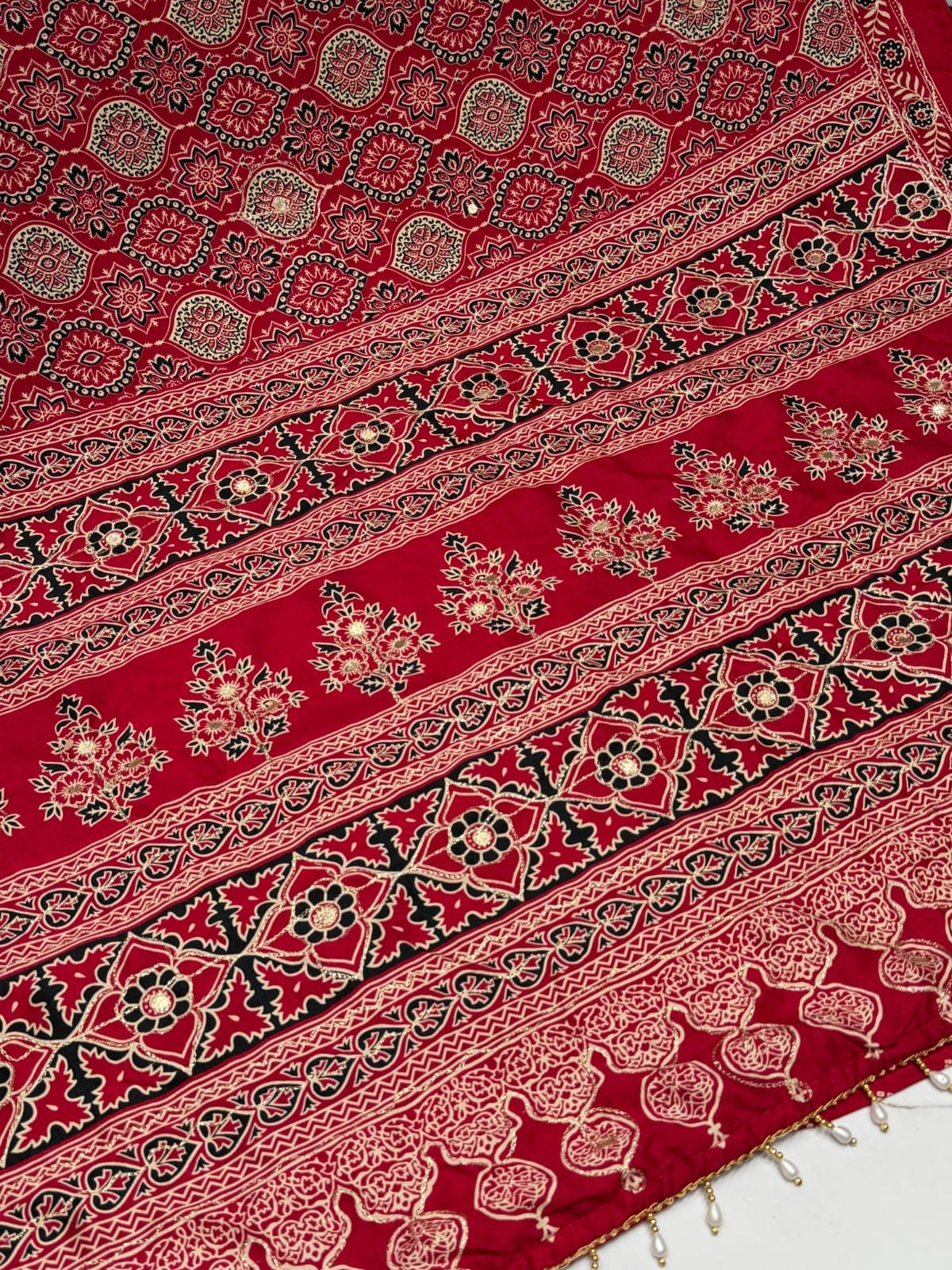 Badam butto & Ajrakh design Saree